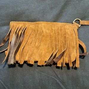 Brown leather fringed clutch. Love the Hustle designs